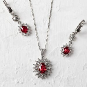 Yaghout Oval Ruby and Diamond Earrings, white gold